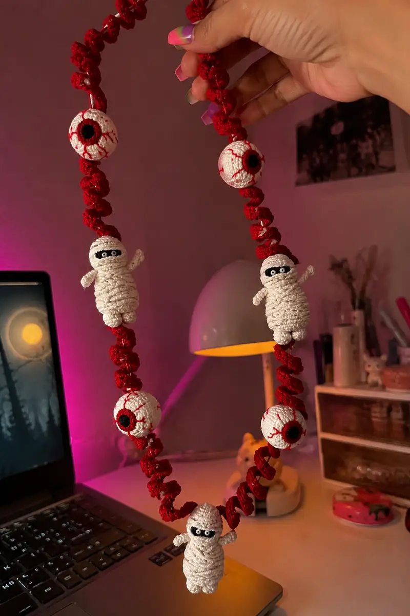 Blood Red Spiral Halloween Garland with Mummies and Bloody Eyes Amigurumi Pattern crochet pattern - detailed view of completed project