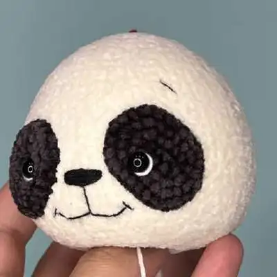 Panda Amigurumi Pattern step 4 - final assembly and finishing