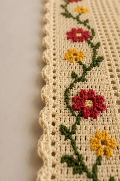 Cream Filet Lace Table Runner with Red and Yellow Flower Vines Pattern step 2 - assembly progress