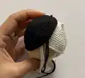 Doll Cruella Amigurumi Pattern step 4 - final assembly and finishing