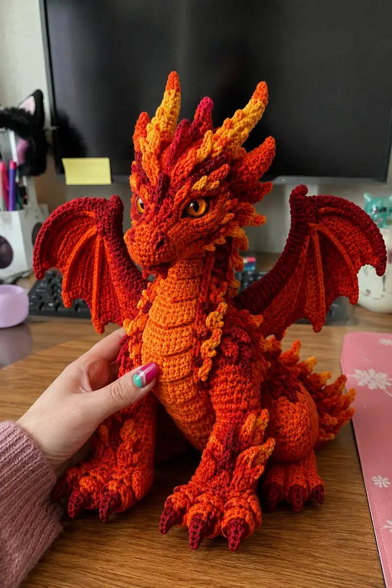 Big Fiery Orange Lava Dragon with Amber Eyes Amigurumi Pattern crochet pattern - detailed view of completed project