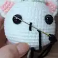 Christmas Giftbox Cat Amigurumi Pattern step 3 - details and accessories