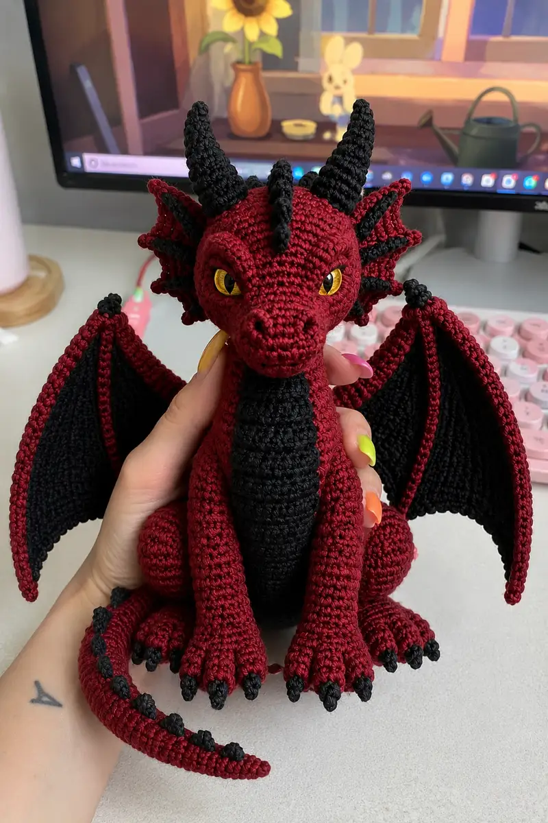 Dark Red Demon Dragon with Black Wings and Yellow Eyes Amigurumi Pattern crochet pattern - detailed view of completed project