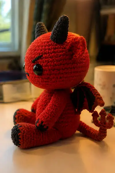 Cute Mad Devil Dragon with Little Pitchfork Tail Amigurumi Pattern step 2 - assembly progress