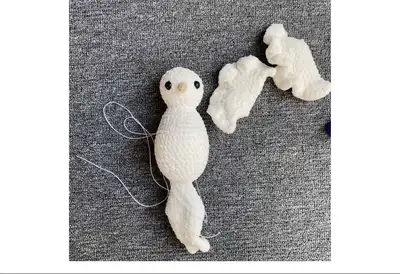 Dove Amigurumi Pattern step 3 - details and accessories