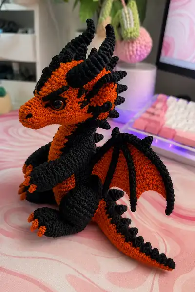 Orange and Black Demon Dragon with Curved Horns Amigurumi Pattern step 2 - assembly progress